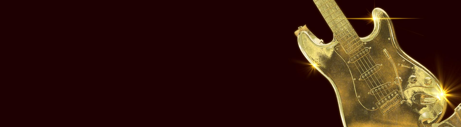 A gold electric guitar on a black background